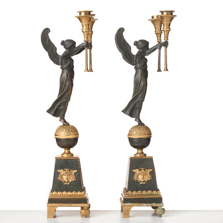 A pair of Empire-style 20th century candelabra.