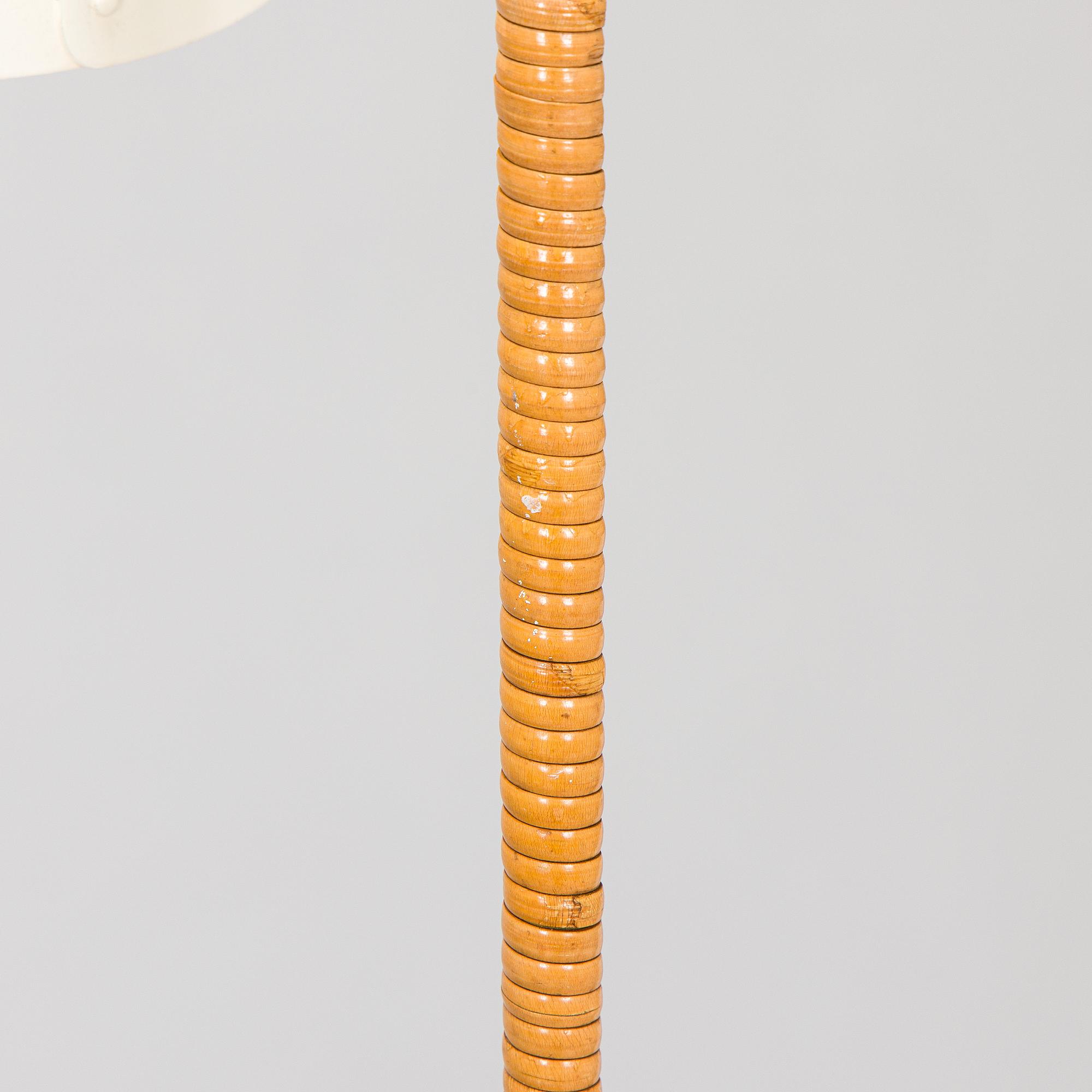 Paavo Tynell, a pair of mid-20th century K10-10 floor lamps for Taito Finland.