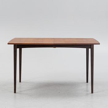 A teak dining table, mid 20th Century.