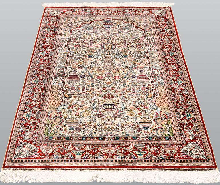 A oriental silk rug, 155 x 93 cm.