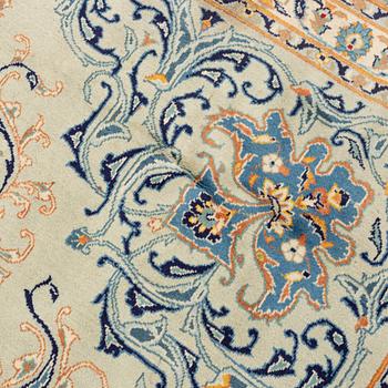 A signed Kashan, carpet ca 450 x 335 cm.
