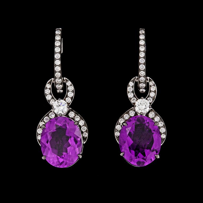 EARRINGS, oval amethysts and brilliant cut diamonds, tot. 0.68 cts.