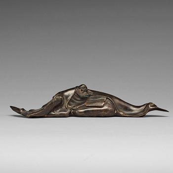 673. A Japanese bronze pen-rest, early 20th century.