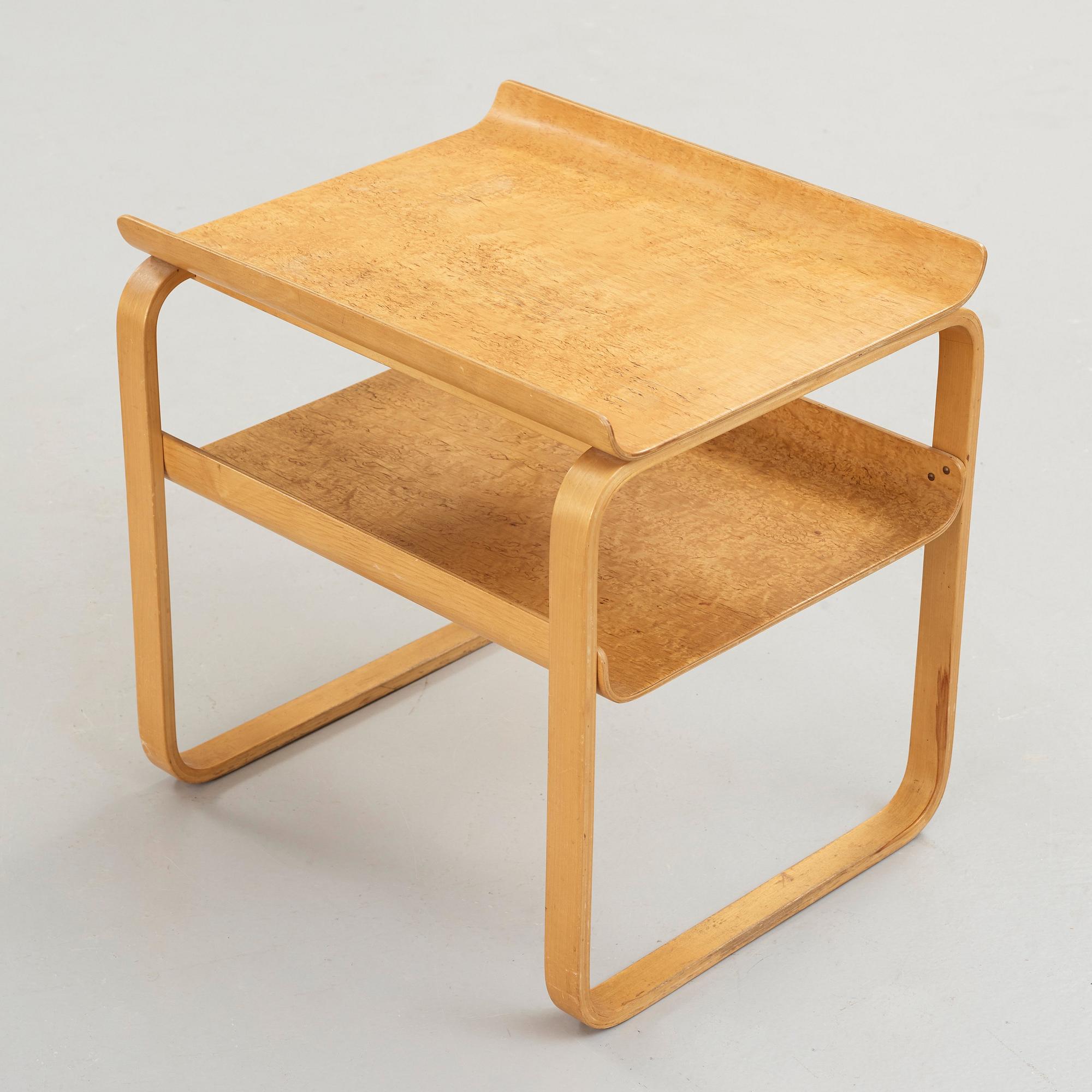 Alvar Aalto, a 'model 75' birch table, made on license by Aalto Design Hedemora for Artek, Sweden 1946-56.