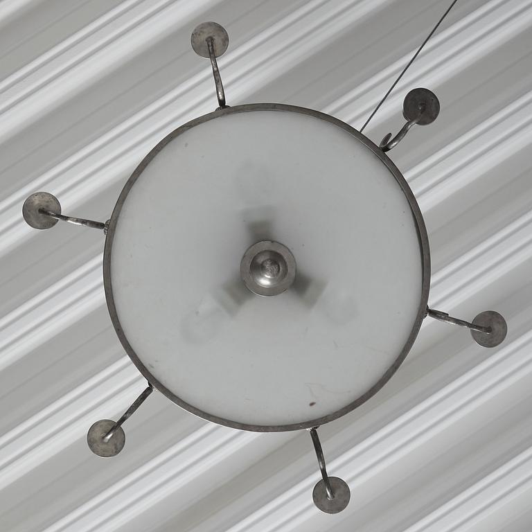 Firma Svenskt Tenn, a pewter and brass chandelier, Stockholm 1926.