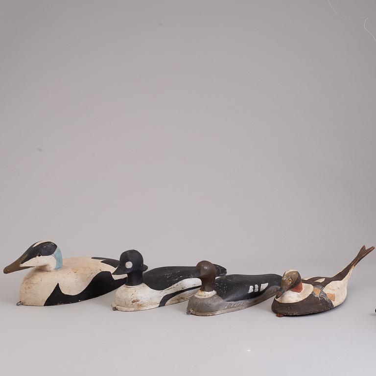 4 painted wooden ducks from the 20th century.