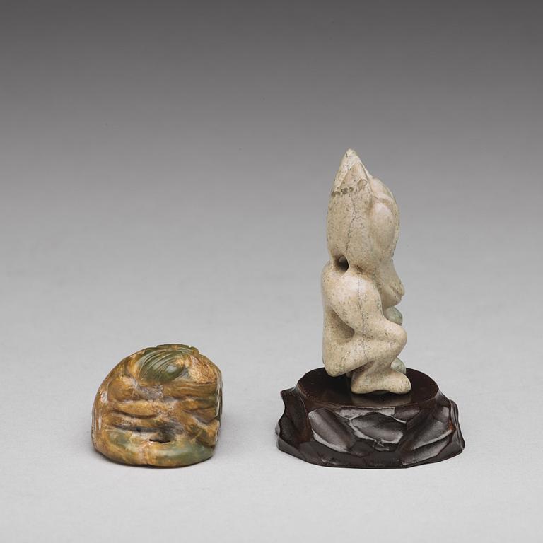 Two archaistic stone sculptures.