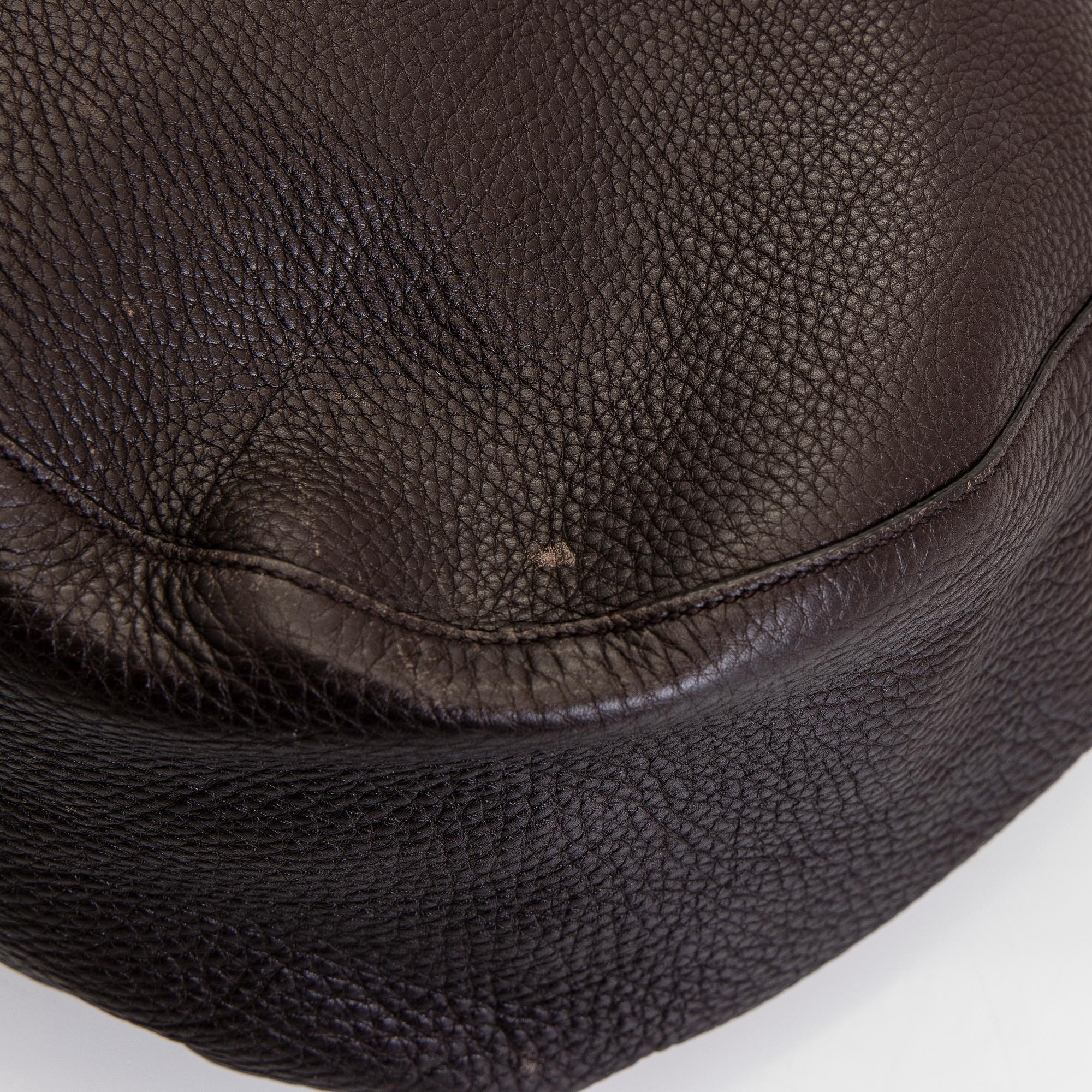 Gucci, an "Interlocking G" bag.