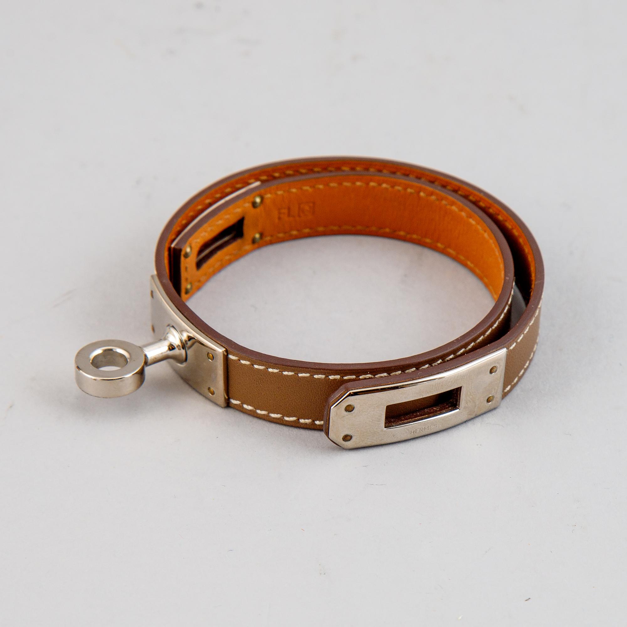 Hermès, a taupe leather 'Kelly Double' bracelet, size XS, 2013.