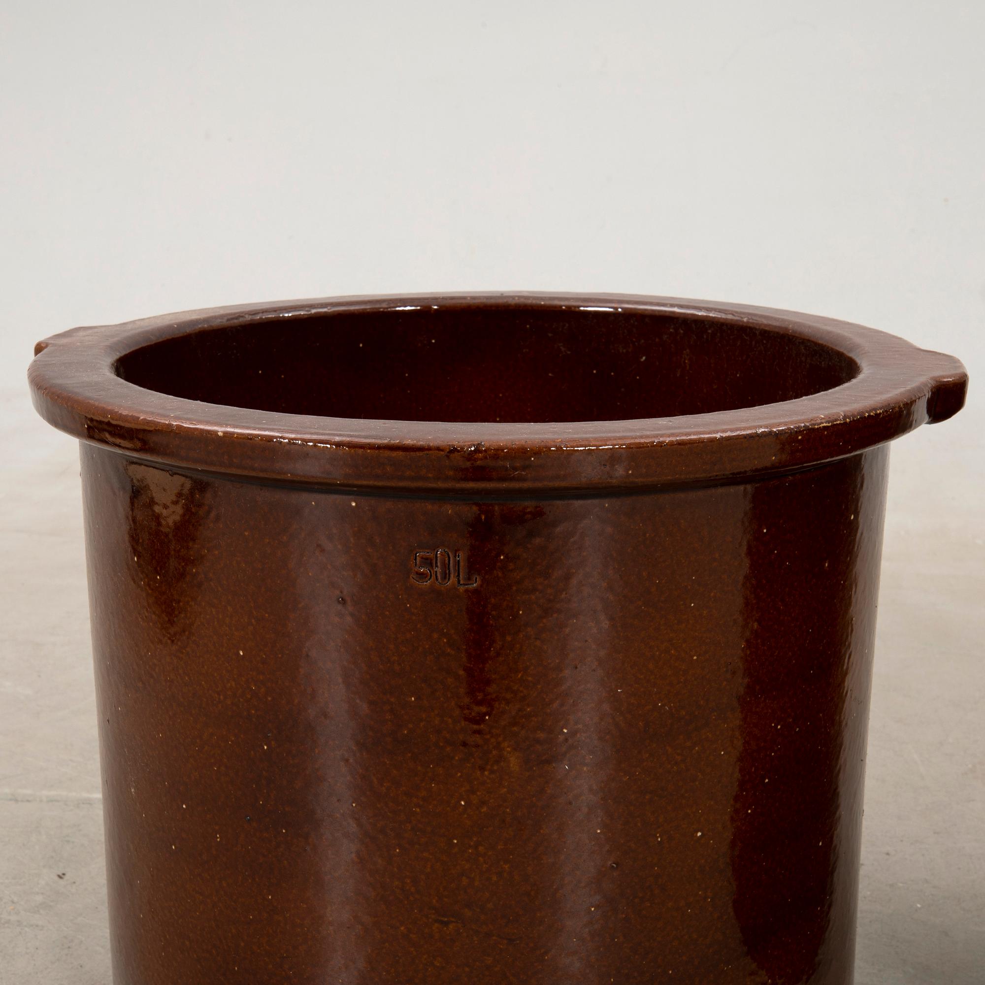 outer casing/vessel a pair of glazed ceramics.