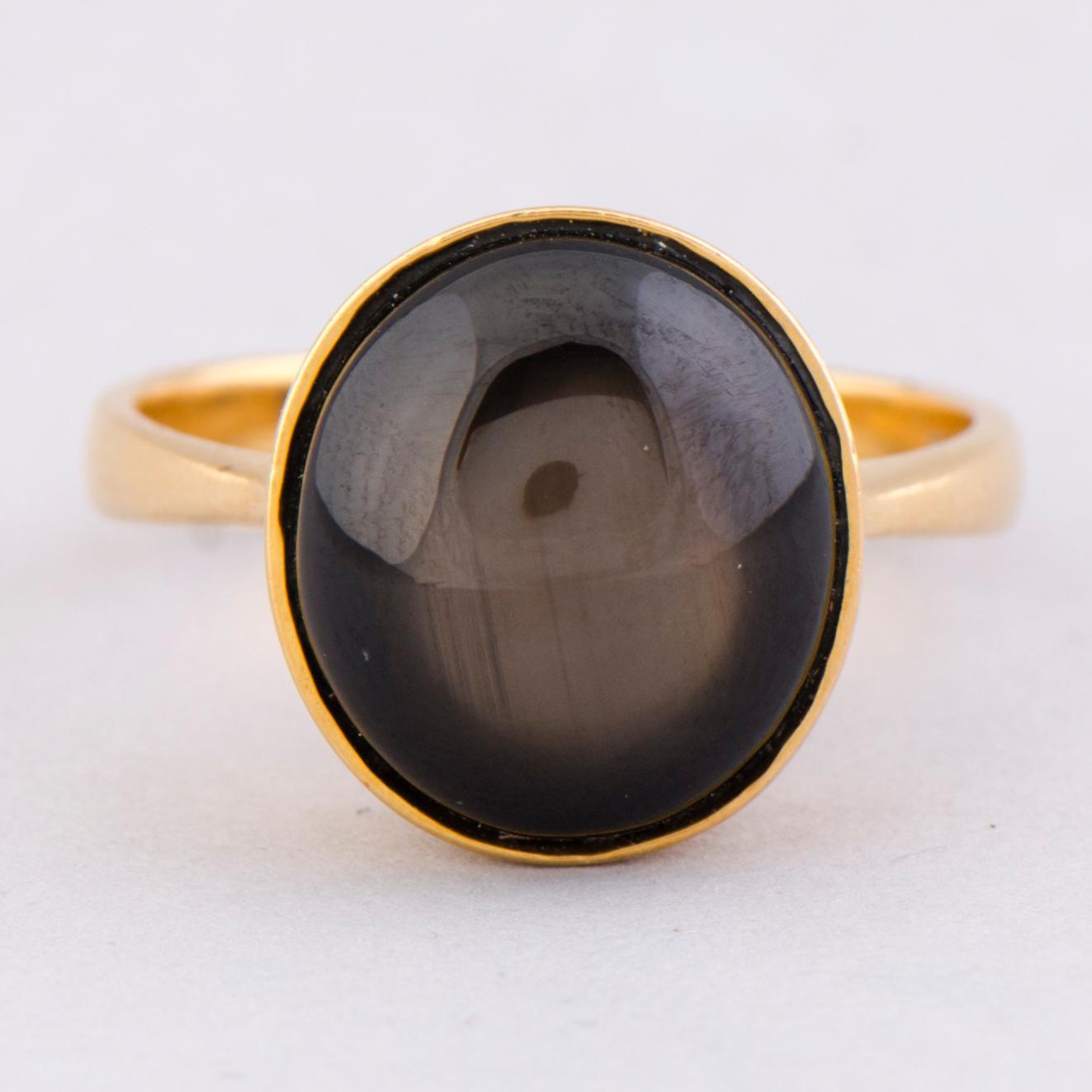 RING, svart stjärnsafir, 18K guld.