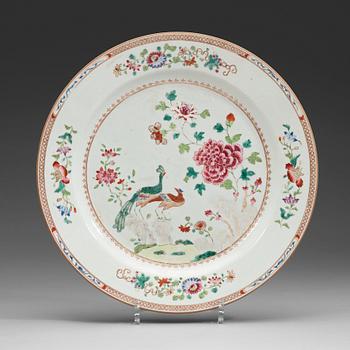 469. An export porcelain famille rose 'double peacock' dish, Qing dynasty, Qianlong (1736-1795).