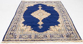 An old Kerman rug, ca. 249 x 148 cm.