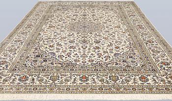 A Keshan carpet, 355 x 260 cm.