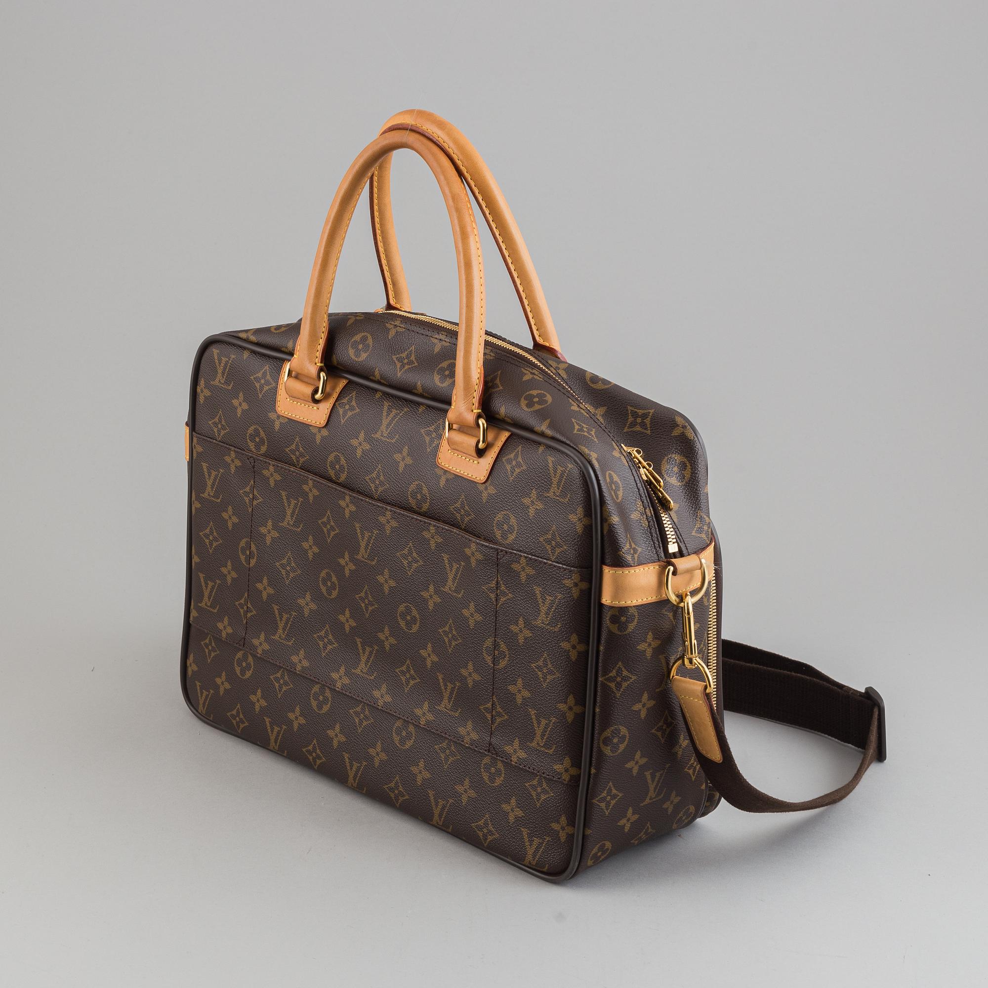 Louis Vuitton, a monogram canvas carry on bag.