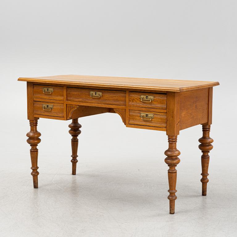 A renaissance style oak writing desk, end of the 19th Century.