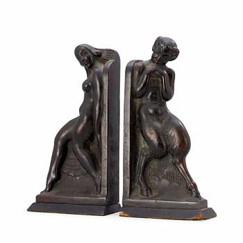 445. A pair of Axel Gute patinated bronze bookends, Sweden 1919.