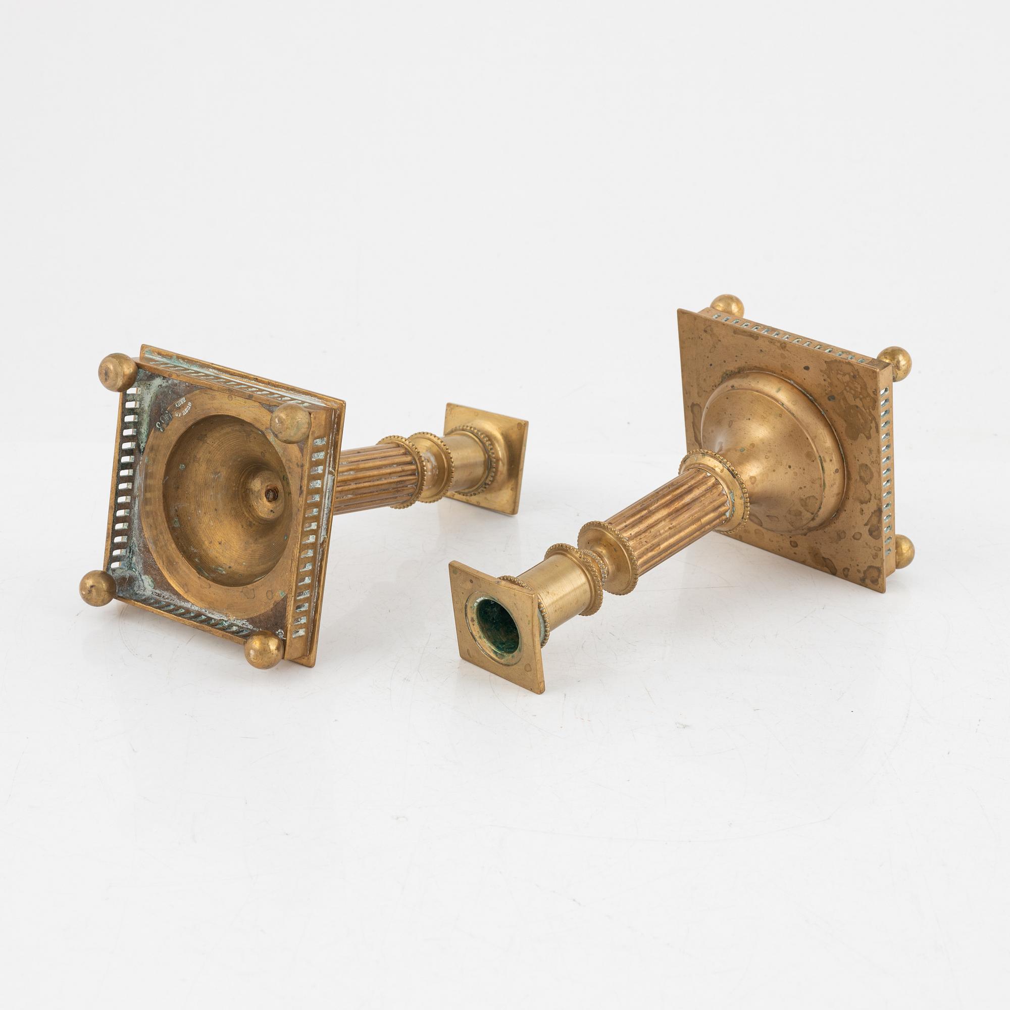 A Pair of Brass Candlesticks, Gusum.
