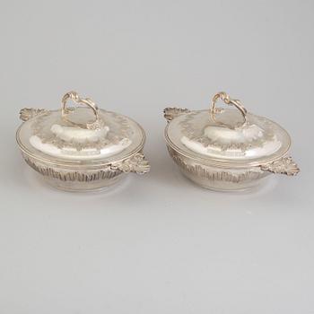 TUREENS, a pair, sterling, silver. Louis XV-style. French export marks after 1879.