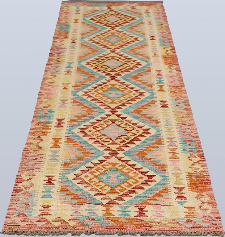 A Kilim runner, c. 293 x 78 cm.