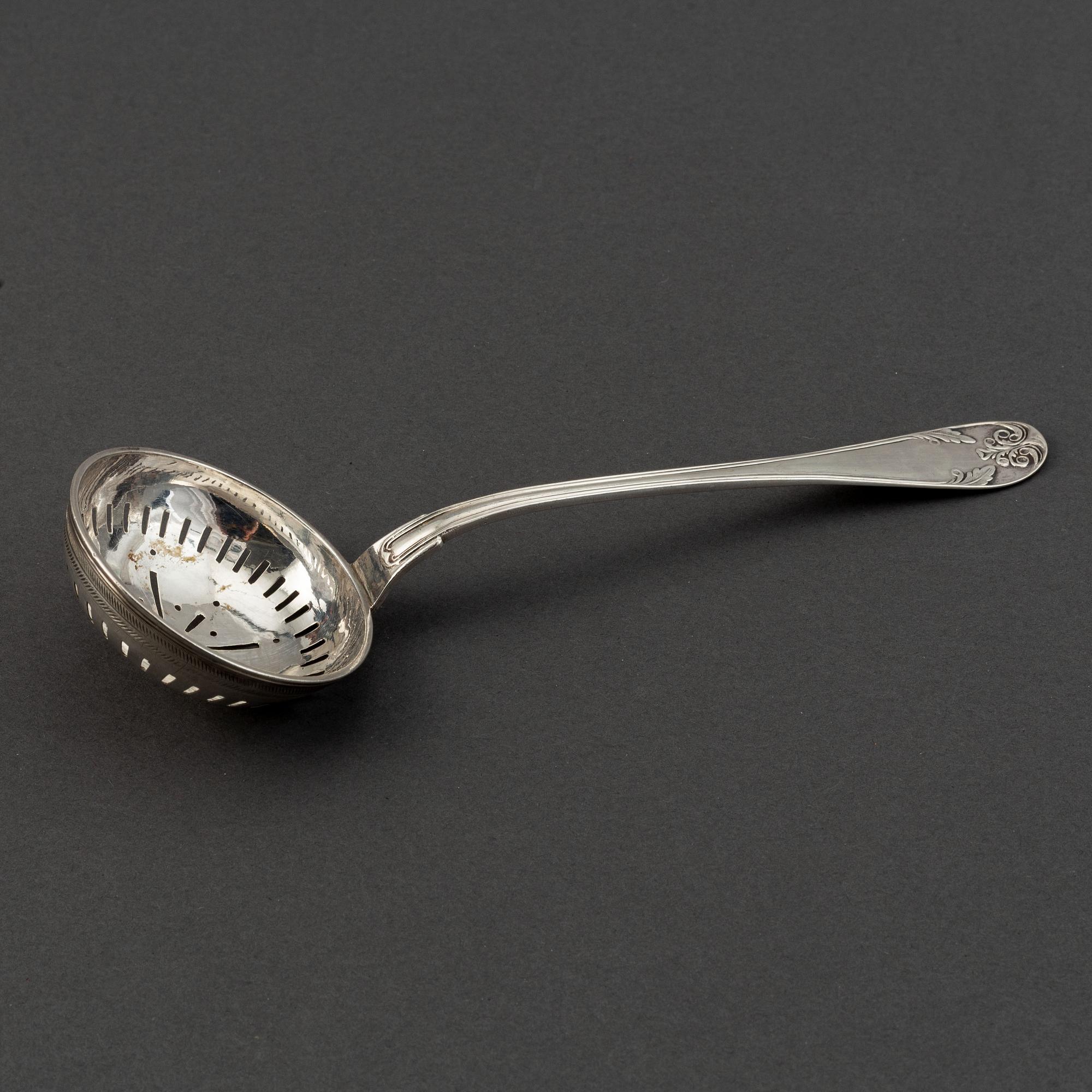 A Swedish 19th century silver caster-spoon, mark of AJ Björkman, Stockholm 1830.