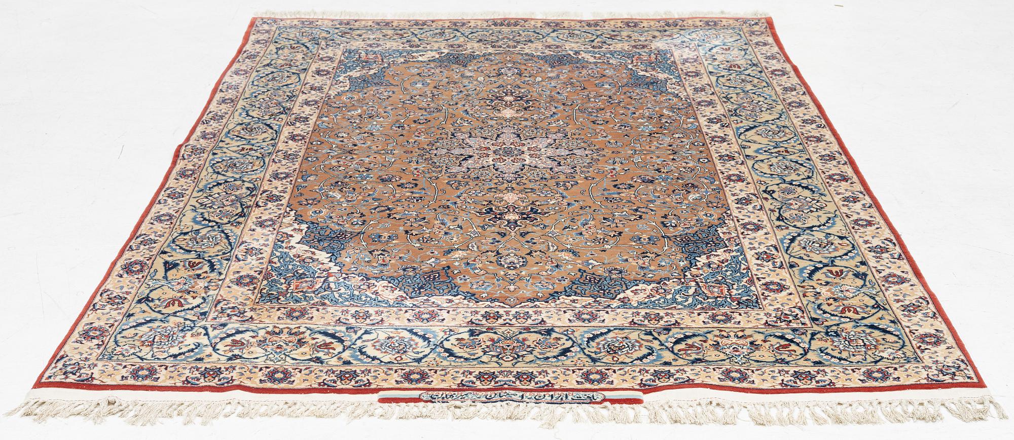 A Isfahan rug, signed (Hossein) Seirafian  222 x 150 cm.
