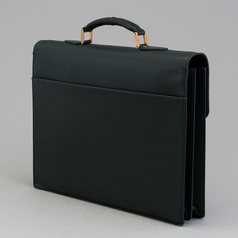 A 'Moskova' taiga leather briefcase from Louis Vuitton.