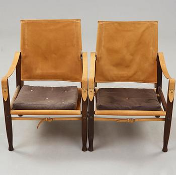 a pair of 'Safari' oak and leather armchairs, Rud. Rasmussen, Denmark, probably 1950's.