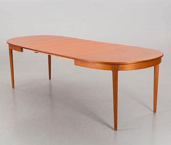 A DINNING TABLE AND FOUR CHAIRS BY CARL MALMSTEN FOR BODAFORS.