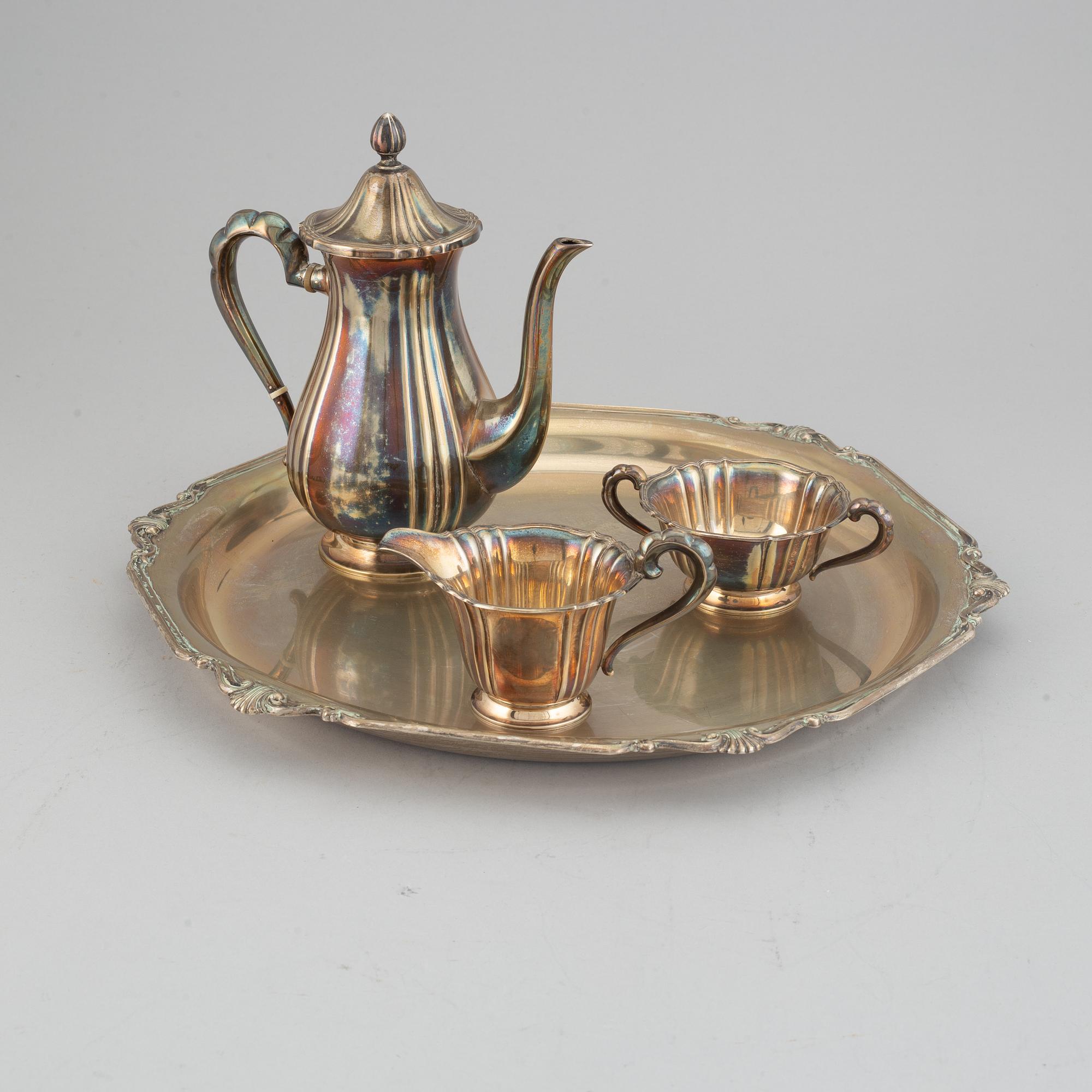 A silver coffee set and a tray, maker's mark Carl Hoff, Helsingborg, Sweden 1934 and 1933,
