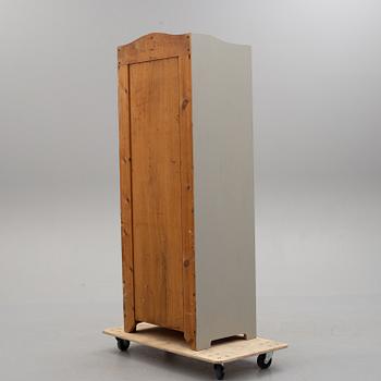 an early 20th century wardrobe.
