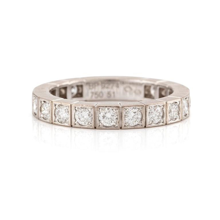 An 18K white gold Cartier ring set with round brilliant-cut diamonds.