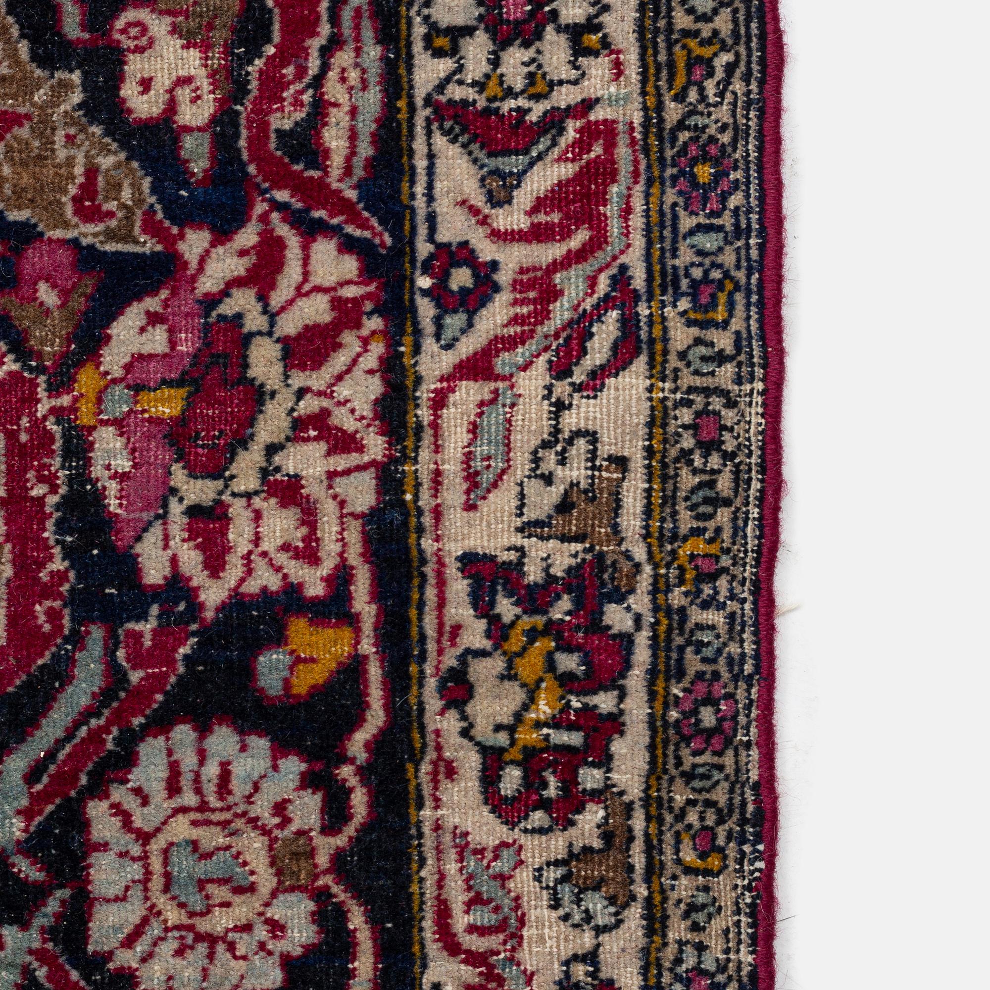 An antique Isfahan carpet, circa 342 x 250-260 cm.