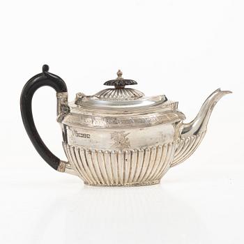 An English silver teapot, mark of Walker & Hall (John Edward Bingham), Sheffield, 1886.