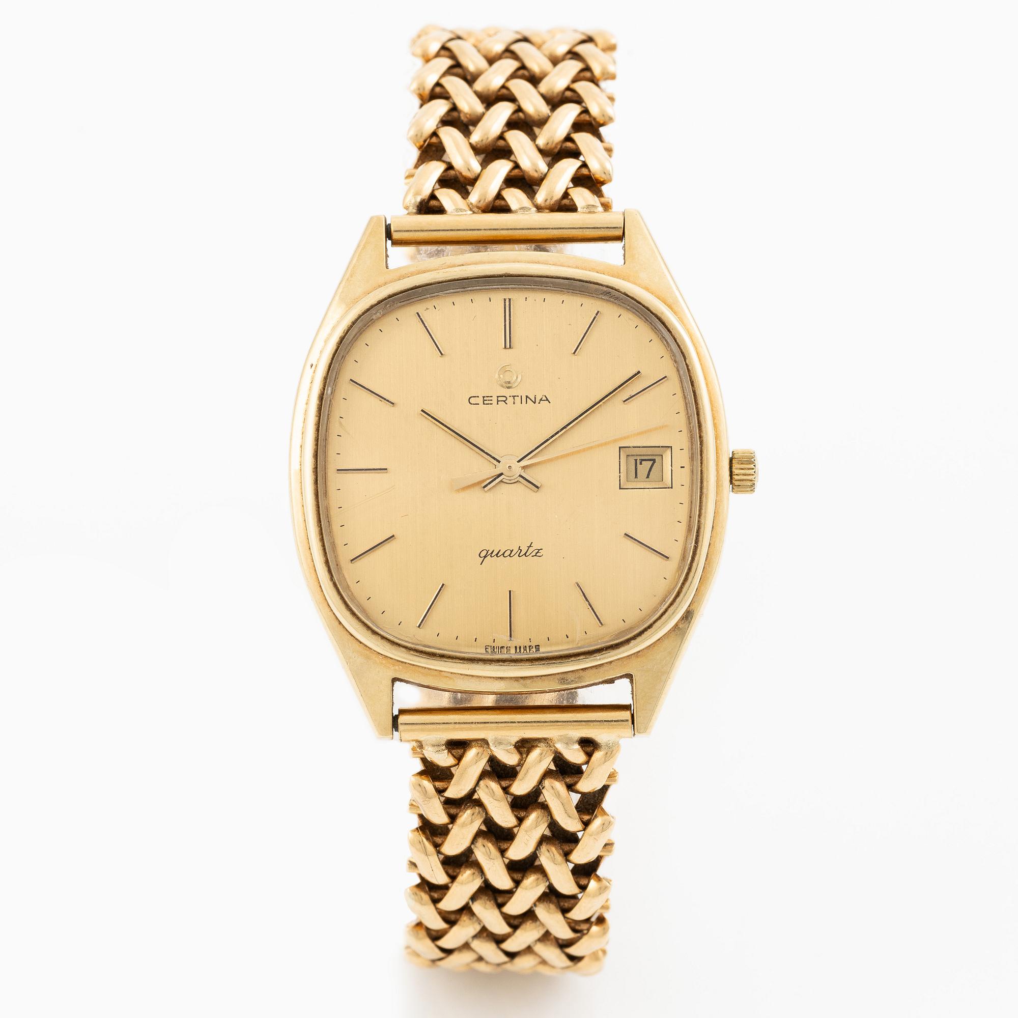 Certina, 14K gold, chain in 18K gold, 33.5 mm.