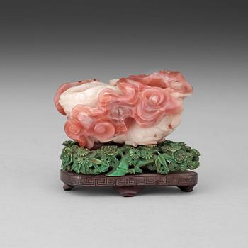A possible agathe brush washer, with a stained green stand, Qing dynasty, presumably Qianlong (1736-95).