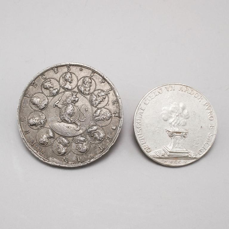 Two pewter medallions, 18th century.