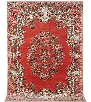 A Tabriz carpet, c. 410 x 199 cm.