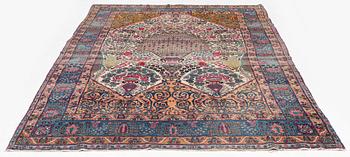 An antique Tehran carpet, north Persia, c. 323 x 195 cm.