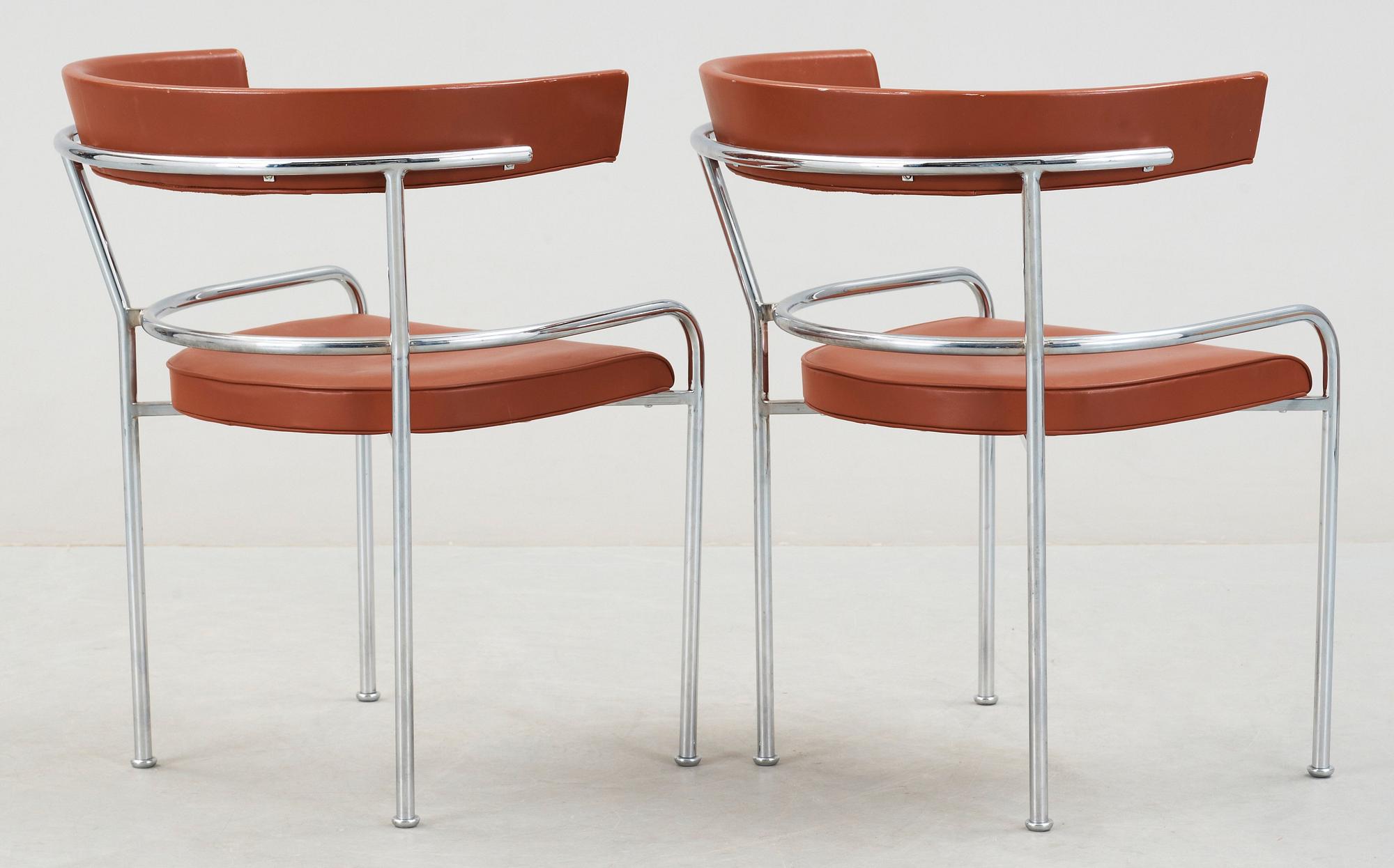 A pair of Gunnar Asplund chromed steel and leather armchairs by Källemo, Sweden post 1988.