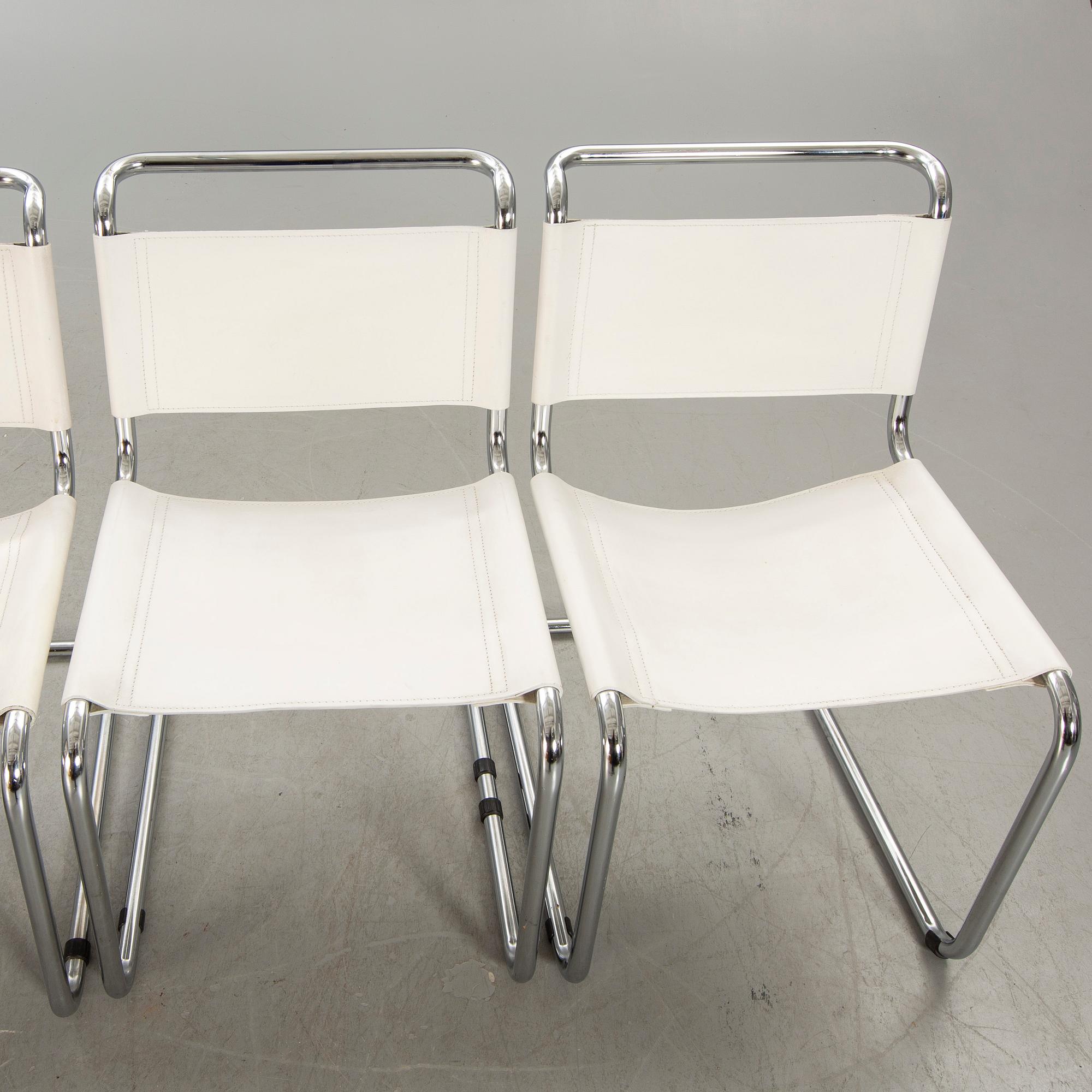 A set of four Italien chrome and leather chairs later part of the 20th century.