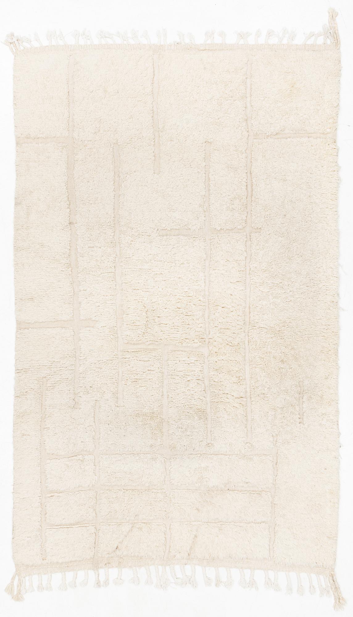 A Moroccan carpet, circa 308 x 181 cm.