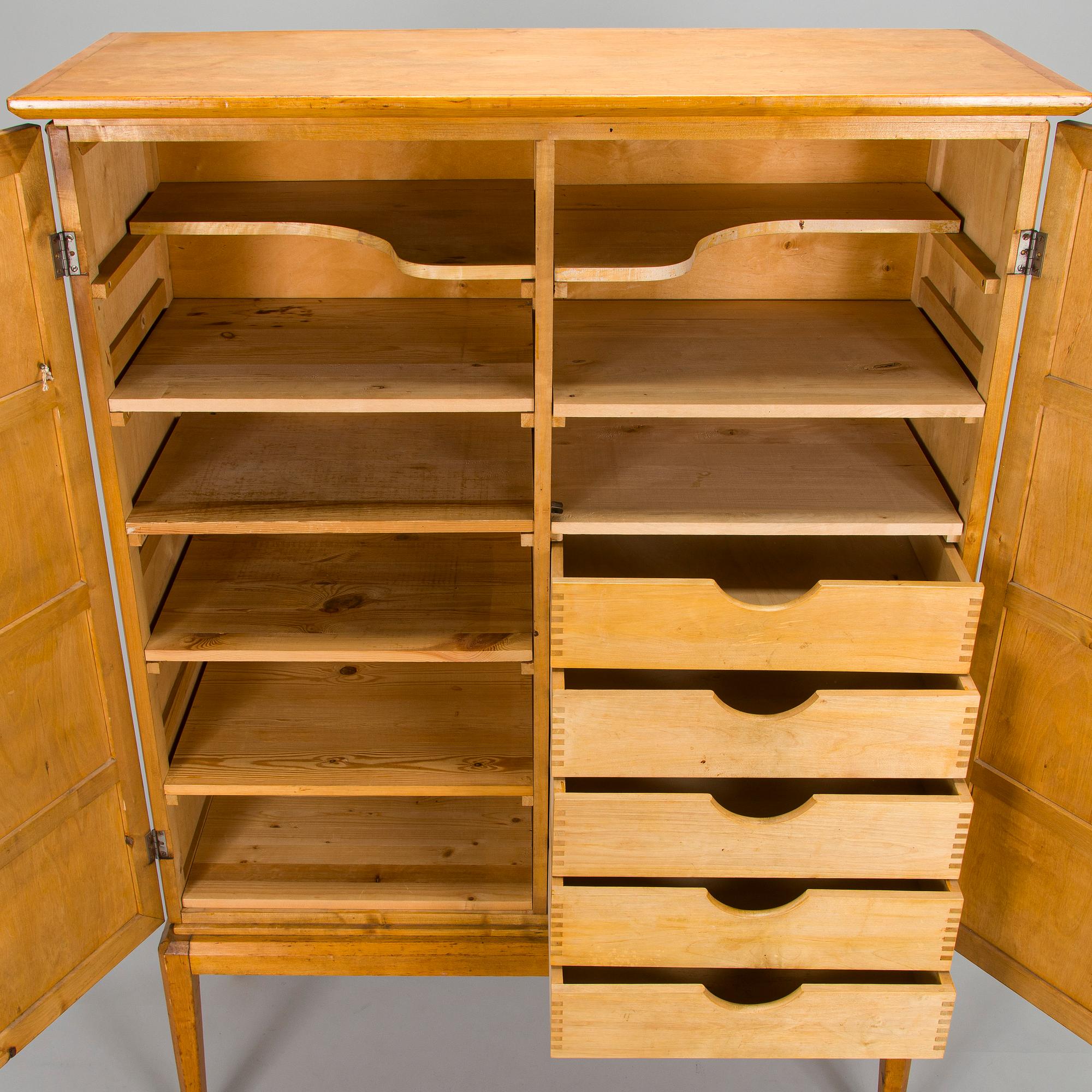 Carl Gustaf Hiort af Ornäs, a mid-1940's cabinet for Hiort Tuote Puunveisto.