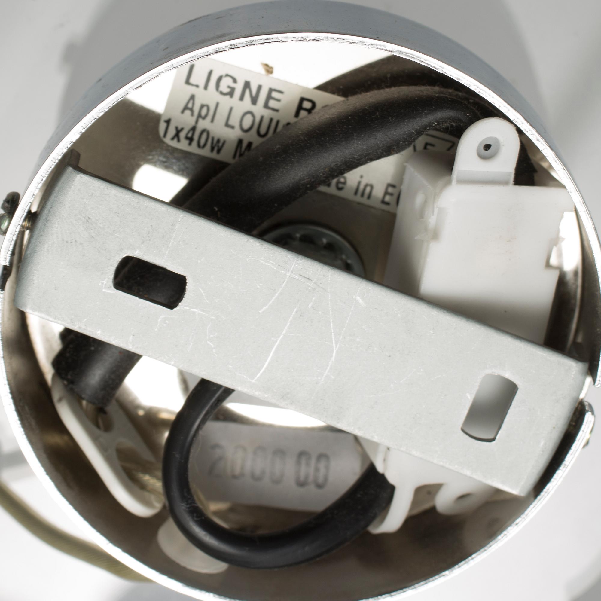 A Ligne Roset 'Louis 5D' wall light by Blandine Dubos.