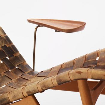 Arne Vodder, a woven leather lounge chair with attached side table, Bovirke, Denmark, 1950s.