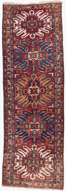 A runner carpet, North Western Iran, c. 317 x 107 cm.