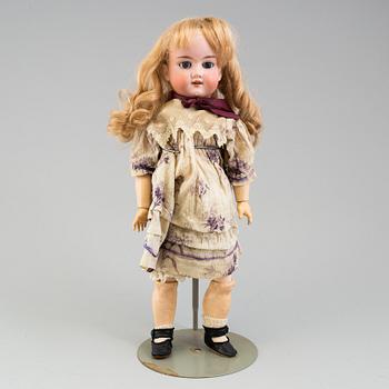 a CM Bergman porcelain doll from around 1900.