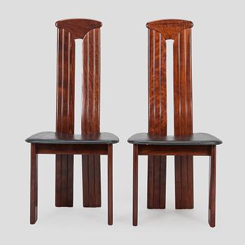A set of eight dining chairs, Italy.