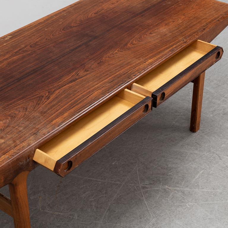 A 1950's/60's rosewood veneered coffee table.