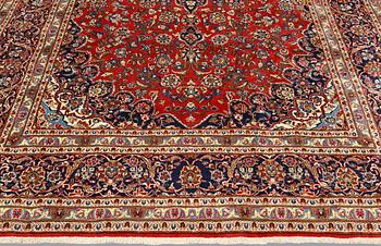 A Keshan carpet, approx. 307 x 200 cm.